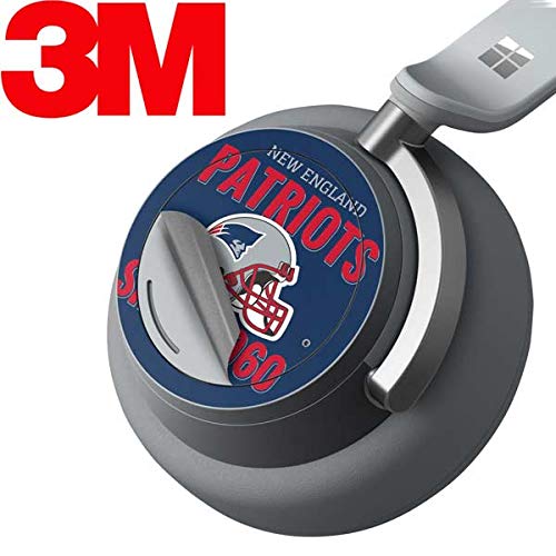 Skinit Decal Audio Skin Compatible with Surface Headphones - Officially Licensed NFL New England Patriots Helmet Design