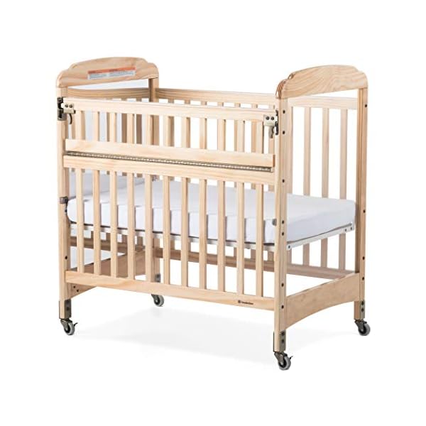 Foundations serenity safereach side compact crib nonmarking commercial casters low profile solid steel frame adjustable mattress board mirrorview end panel natural wood  urban country home decor