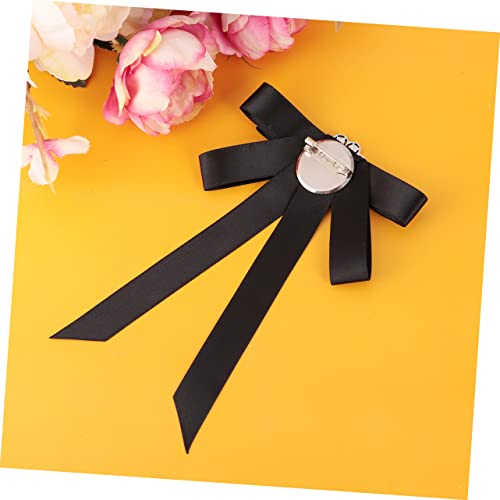 Broche bowknot en strass idéale sur une cape pour les soirées
