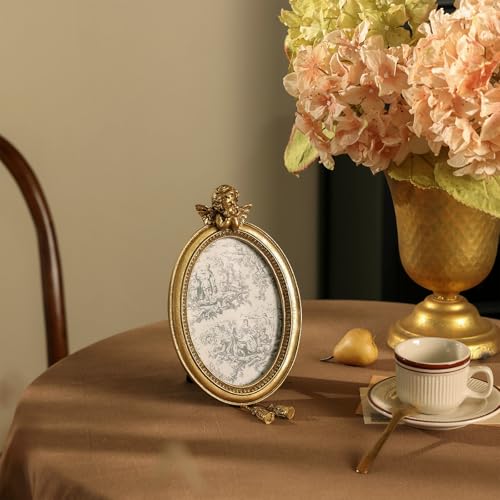 Image of NIKKY HOME Vintage Picture Frame 4x6, Retro Gold Photo Frames Tabletop and Wall Mount, Oval Photo Frame with Stand and Glass Front for Family Portraits Antique Gallery Decor Home Decor