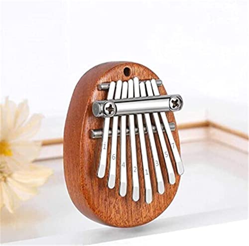Qianderer Mini piano à pouce 8 touches Kalimba avec cordons, cadeau de Noël pour la famille, marron - Les Beatles, Paul McCartney, John Lennon, RIngo Starr, George Harrison Qianderer Mini piano à pouce 8 touches Kalimba avec cordons, cadeau de Noël pour la famille, marron – Image 7