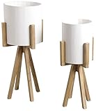 Design moderne : Ces cache-pots ronds en bois laqué blanc sur pieds en bois naturel apportent une touche contemporaine à votre décoration intérieure