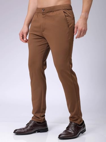 Image of The Indian Garage Co Men Slim Fit Solid Mid-Rise Stretchable Knitted Jogger Trousers