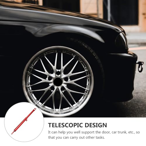 Porte voiture et coffre stabilisés par cette tige télescopique de fixation rouge