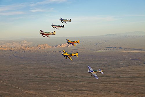 Posterazzi PSTSGR100106M Extra 300 aerobatic aircraft fly in formation during APS training in Mesa...