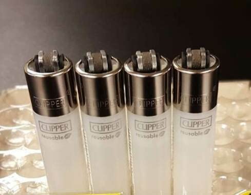 Set Of 4 New Clipper Lighters Regular Size Clear colour