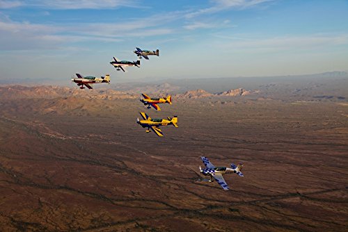 Posterazzi PSTSGR100105M Extra 300 aerobatic aircraft fly in formation during APS training in Mesa...