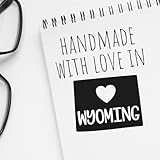 HANDMADE WITH LOVE IN WYOMING STAMP UNIQUE HANDMADE DESIGN: Our "Handmade with Love in Wyoming" stamp features a charming hand-drawn font and a heart symbol within the state outline, adding a personal touch to your crafts. Showcase your Wyoming pride...