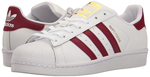 Image of adidas Originals Women's Superstar Sneaker, White /Collegiate Burgundy /Gold Metallic, 7.5
