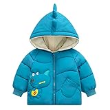 Babys Lieblingsmuster: Der niedliche Dinosaurier-Print und die Mütze im Dinosaurier-Stil sind bei Babys sehr beliebt.