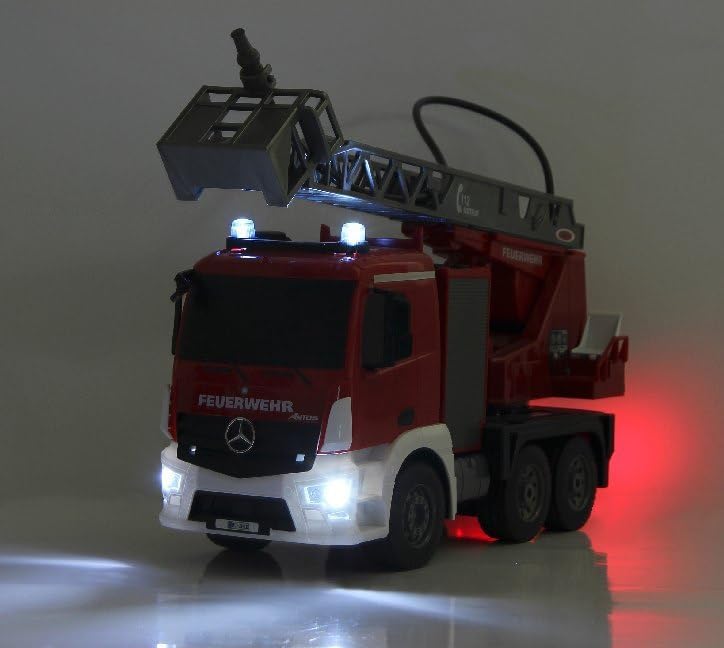 Jamara Fire Fighter Mercedes Benz Antos Utility Vehicle with headlights and blue signal lights illuminated.