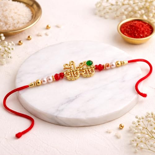 Image of JAIPUR ACE Designer Shree Radhe Rakhi with Pearl & Stone Beads- Premium Gold Finish Raksha Bandhan Thread for Brother,Rakhi with Elegant Red String and Festive Traditional Design (Radhe Radhe Rakhi)