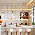Phaosio Kitchen Island Linear Pendant Light, 4-Light Gold Dining Room Chandelier with Clear Glass Globe Shades, Modern Linear Lighting Fixture Over Table