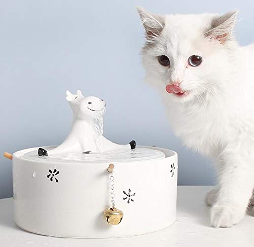 cat drinking fountain ceramic