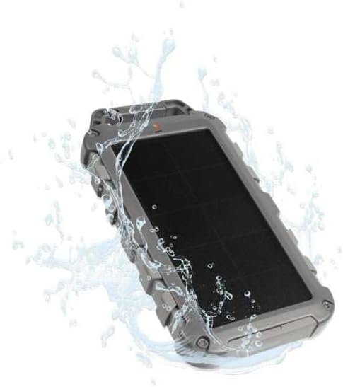 Xtorm FS405 Solar Powerbank being splashed with water, demonstrating its IPX4 water resistance.