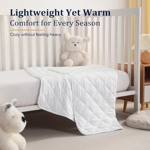 Image of BEDSUM Toddler Quilt 39x47, Microfiber Baby Quilt for Crib, White | Lightweight Toddler Blanket for Boys Girls Nursery, Machine Washable All Season Kid Quilt, Tummy Time Blanket, Stroller Quilt