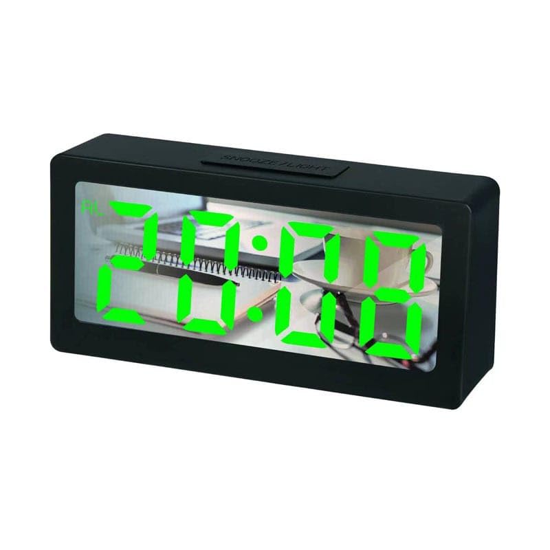 Image of the DS-3633L LED Mirror Clock displaying the time 16:58 in a dimly lit room, highlighting the clear visibility of the LED display at night.
