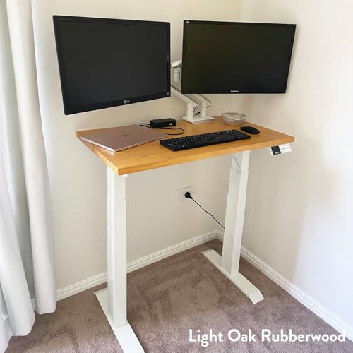 Image of Desky Small Electric Standing Desk, 40 x 24 inches Rubberwood Height Adjustable Sit Stand Desk with Dual Motor and Memory Presets, Compact Home Office Workstation - Natural Wood Top