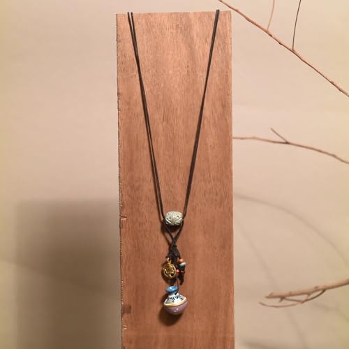 Image of AAKRITI ART CREATIONS Handcrafted Tribal & Boho Ethnic Necklace Collection | Floral, Mandala, Tassel & Dhokra Pendant Designs | Artisan Brass, Wood & Statement Jewelry for Women