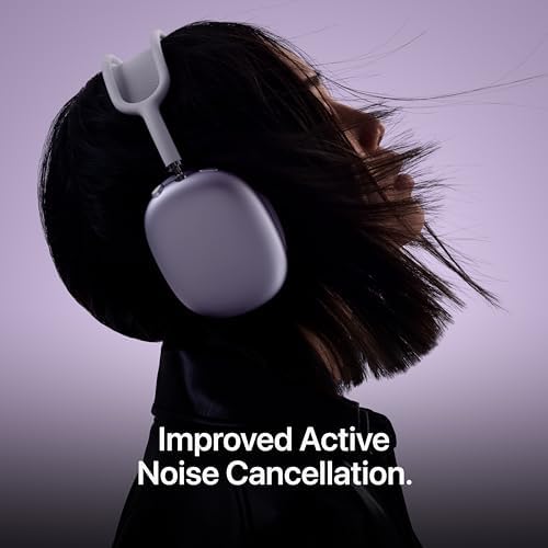 User wearing AirPods Max 2, enjoying music outdoors.
