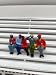 F1062 - Greenhills Scalextric Carrera Group of 5 Seated Spectators 1.32 Scale Hand Painted - NEW