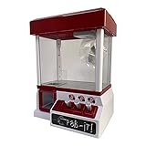 maquina grua caramelos Juego clásico, un intento exitoso es recompensado con un premio que cae del sonido de los aplausos y la música.