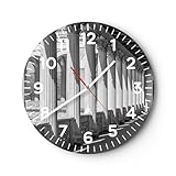 Une décoration murale unique, comme l’est l’horloge murale, appelée aussi Wall clock, est une solution à la mode et moderne pour tout amateur de design. Catégorie thématique de l'horloge murale: Architecture, Noir et blanc. L’horloge murale ARTTOR vous ravira par son design, sa durabilité et sa solidité. Pour garantir une haute qualité, les horloges murales sont recouverts d'un stratifié pour protéger l'impression.