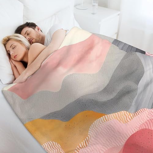 Couverture portable pour canapé et soirées cocooning devant la télé