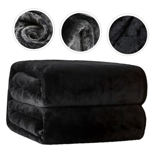 Couverture polaire douce noire confortable contre le froid de la climatisation