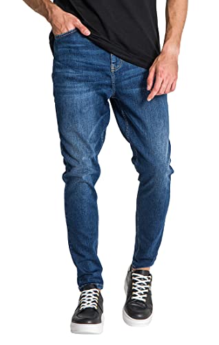 Jeans pour des hommes avec coupe carrot leg ajustée coloris dark blue