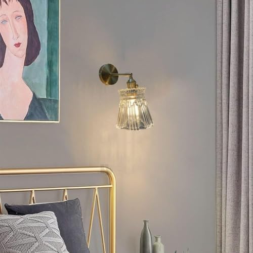 Applique rétro or antique ajustable pour optimiser l'éclairage de lit