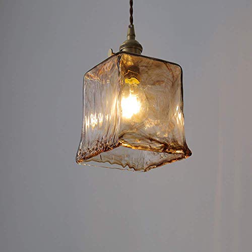 Lampe à suspension en cuivre pour créer une ambiance bistrot rétro