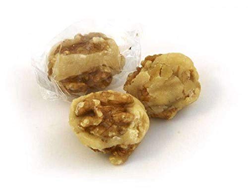 Nueces al fondant. Mazapán con nueces bañado en azúcar hirviendo y envasados individualmente. Se sirven en cajas de 1kilo