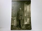  Militaria. Unbekannter Soldat in Uniform. Alte Ansichtskarte / Postkarte s/w. ungel. 1915. Stempel : Landsturm Inf. Bat. 2. Komp. - Grossenhain.