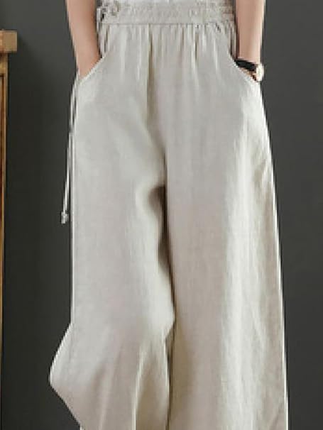 Image of KOTTY Women's Crumble Fabric High Waist Drawstring Wide Leg Trousers with Pockets