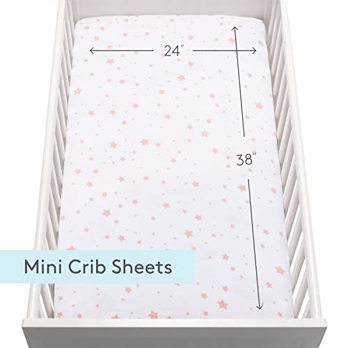 Image of Newton Baby Fitted Mini Crib Sheets (2-Pack) | Organic Muslin Cotton, Breathable & Soft Baby Sheets, Washable Baby Mattress Sheets, Fits Mini Crib Mattresses 24 inch x 38 inch, Stardust Coral & Plain White