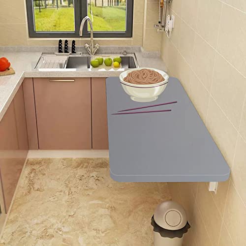 Table murale rabattable compacte résolvant le manque d'espace bureau