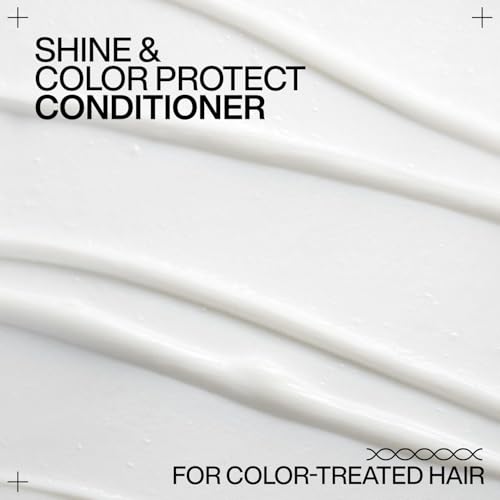 Image of Redken Acidic Color Gloss Conditioner, 300 ml | Professional Conditioner for Color Protection. Seals the cuticle to lock in shine for a smooth, glossy finish.