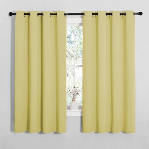 Image of NICETOWN Bedroom Curtain Panels Blackout Draperies, Thermal Insulated Solid Grommet Blackout Curtains /Drapes (Paler Yellow, 1 Pair, 55 by 68-inch)