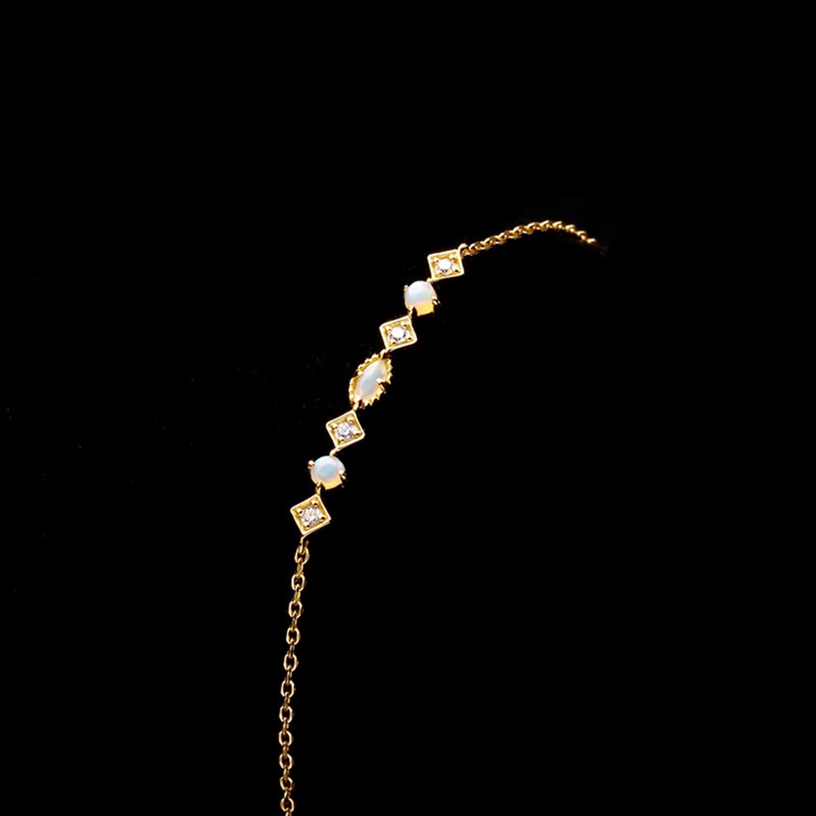Au 375/585/750 - Bracciale in vero oro giallo con opale ovale classico