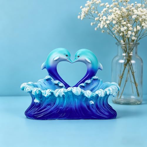 Estatua de delfín con diseño de corazón