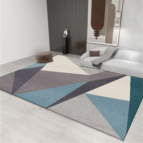 Tapis géométrique moderne bleu gris de dimensions 80x120cm à usage multiple