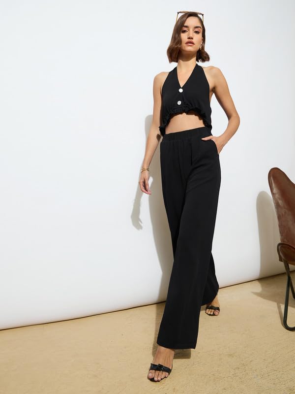 Image of barcino Black Knitted Halter Neck Cut-Out Jumpsuit