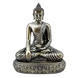 DESIGN: Représentation traditionnelle du Bouddha en position de méditation (lotus), assis sur un socle décoratif orné de motifs géométriques