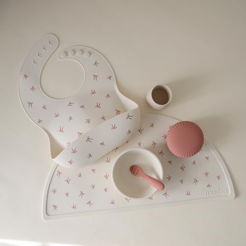 Image of mushie Silicone Baby Bib | Adjustable Fit Waterproof Bibs (Bows)
