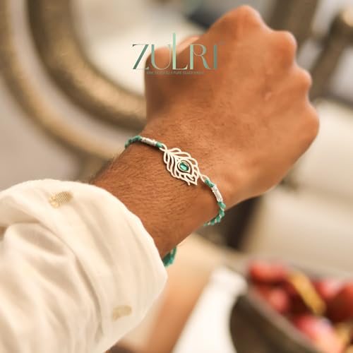 Image of 92.5 Sterling Silver Peacock Feather with Stone Thread Rakhi For Rakshabandhan | Rakhi With Fragrance Greeting Card & Roli Chawal and Silver Certificate of Authenticity