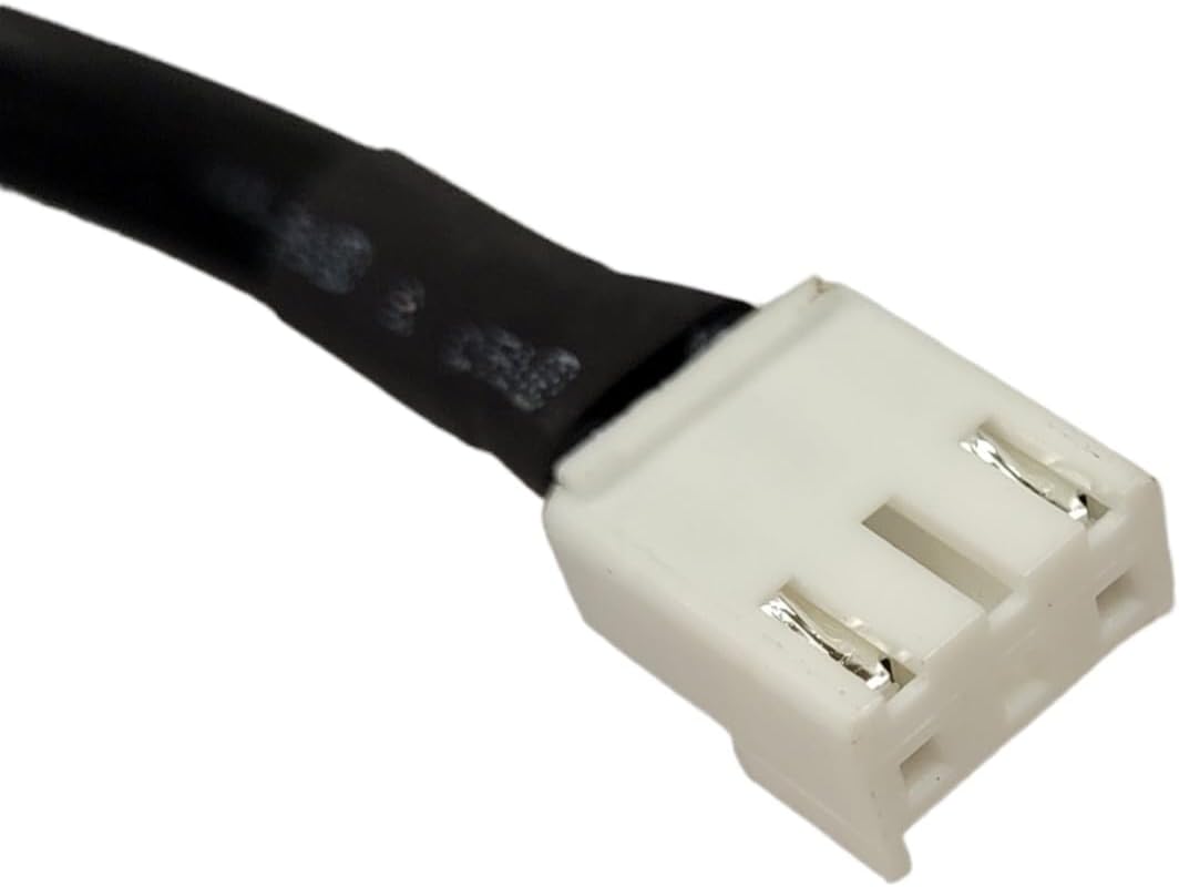 Close-up of the white female connector end of the power cord, showing the internal pins from the front.