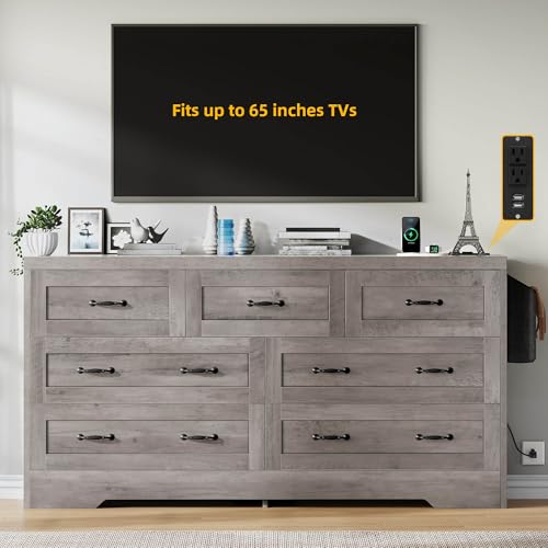 DWVO Farmhouse 7 Drawer Dresser for Bedroom, 31.5 Inch Tall Modern Dresser TV Stand with Large Drawers & Bar Handles, Storage Dressers with Power Outlets, Rustic Wood Chest of Drawers, Grey