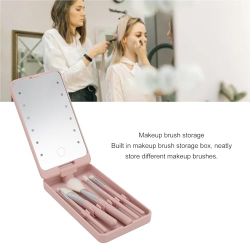 A woman applying makeup using one of the brushes from the Dioche set, with the LED mirror open in the foreground.