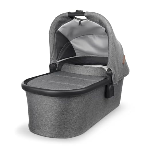 UPPAbaby Bassinet/Compatible with Vista, Cruz, Ridge, Minu Strollers/Overnight Sleep Solution/Mattress, Sheet, and Bug Shield Included/Greyson (Charcoal Mélange/Carbon Frame)